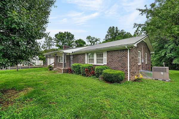 3.44 Acres of Land with Home for Auction in Dowelltown, Tennessee