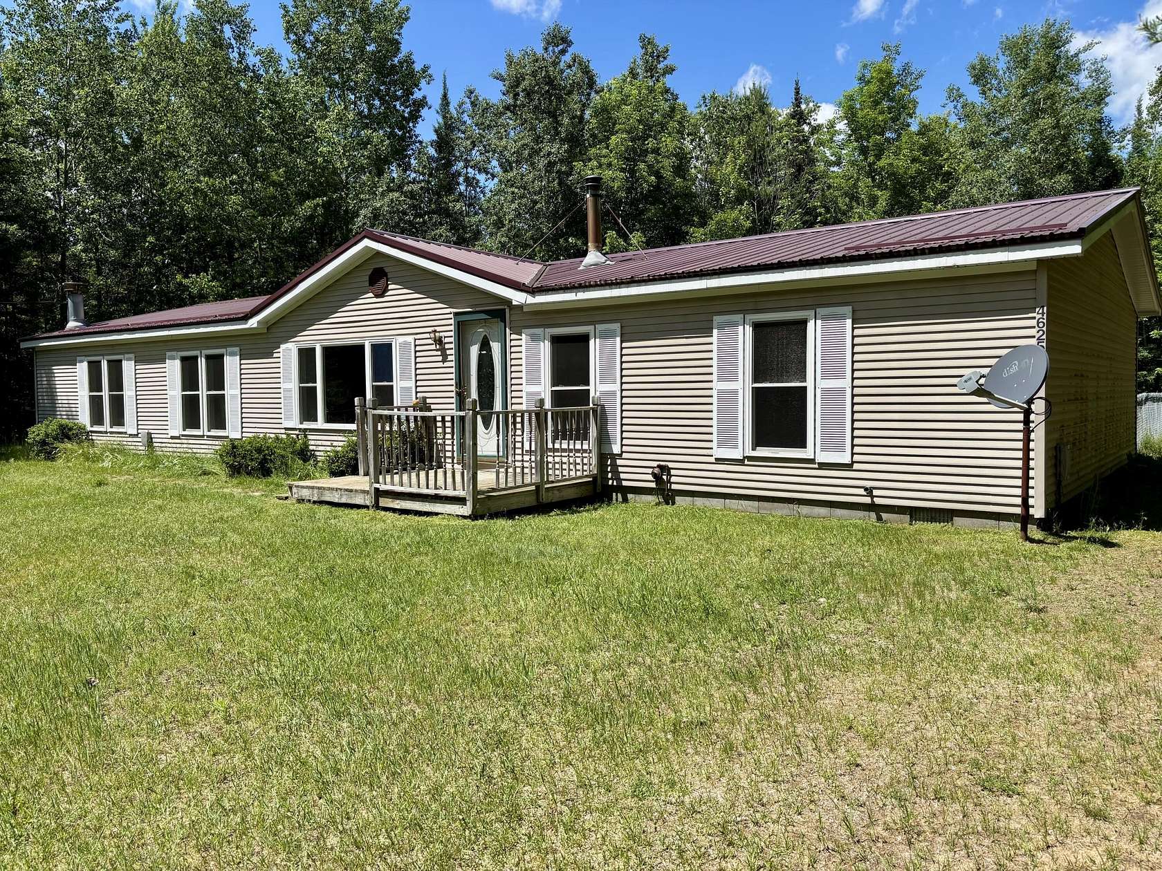 10 Acres of Recreational Land with Home for Sale in Barton City, Michigan