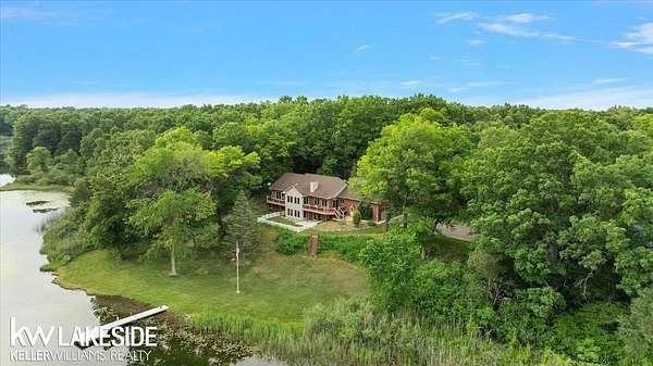 16 Acres of Recreational Land with Home for Sale in Oxford, Michigan