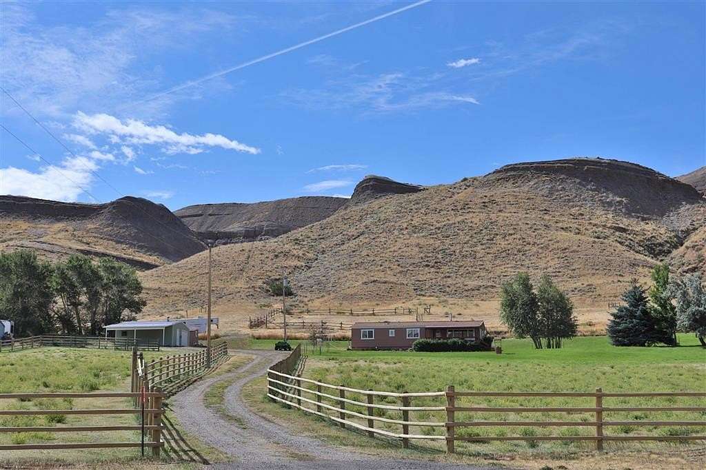 7.6 Acres of Land with Home for Sale in Cody, Wyoming