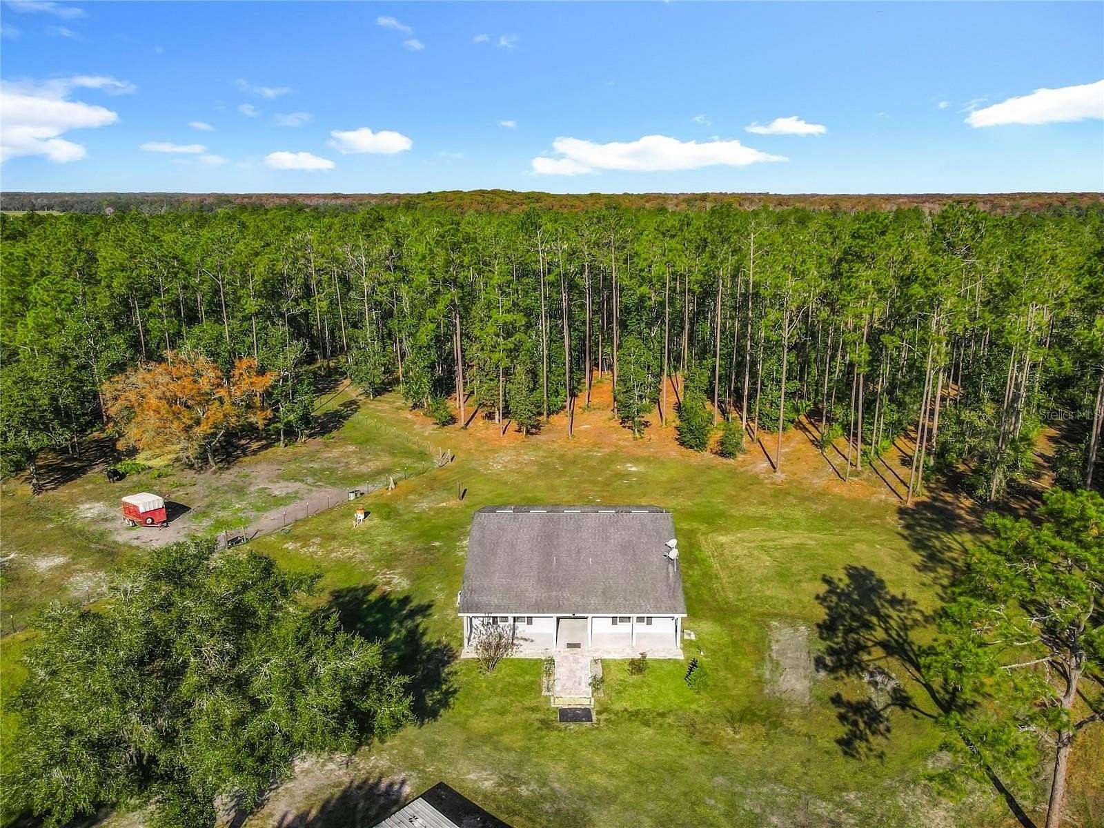 10 Acres of Land with Home for Sale in De Leon Springs, Florida