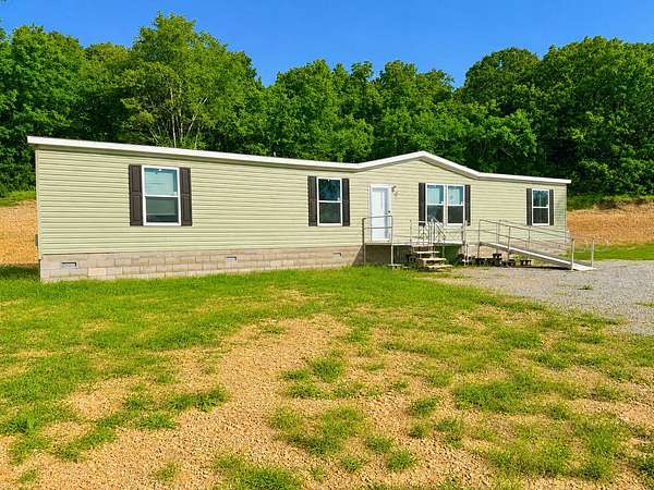 2.5 Acres of Land with Home for Sale in Anderson, Missouri