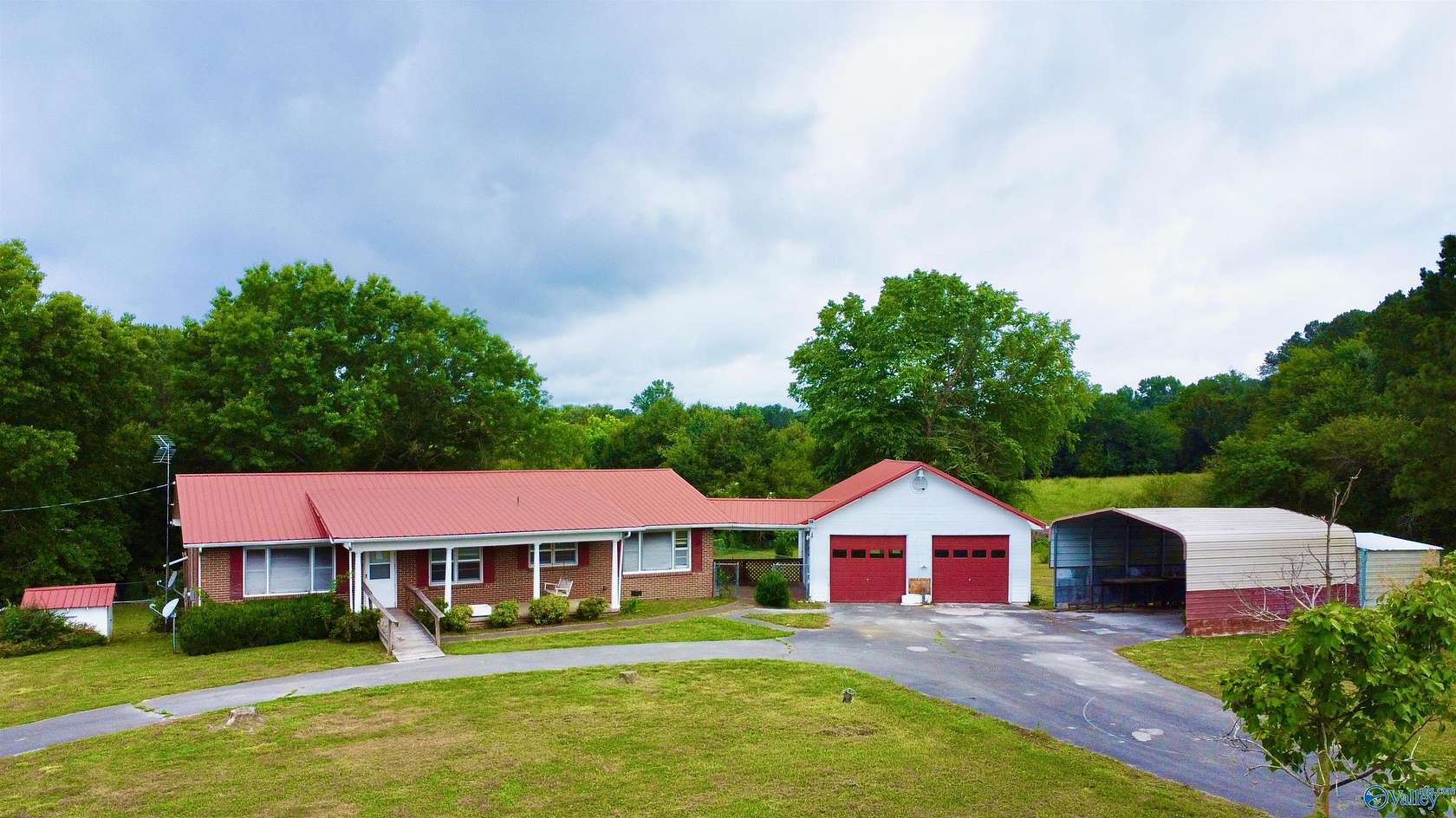 4.5 Acres of Land with Home for Auction in Arab, Alabama