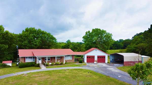 4.5 Acres of Land with Home for Auction in Arab, Alabama
