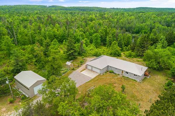 80 Acres of Recreational Land with Home for Sale in Fairview, Michigan