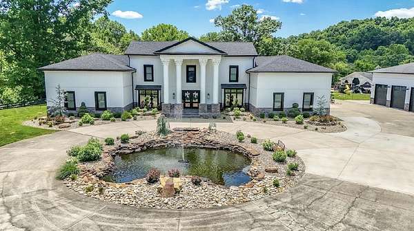 30.2 Acres of Agricultural Land with Home for Sale in Flat Lick, Kentucky