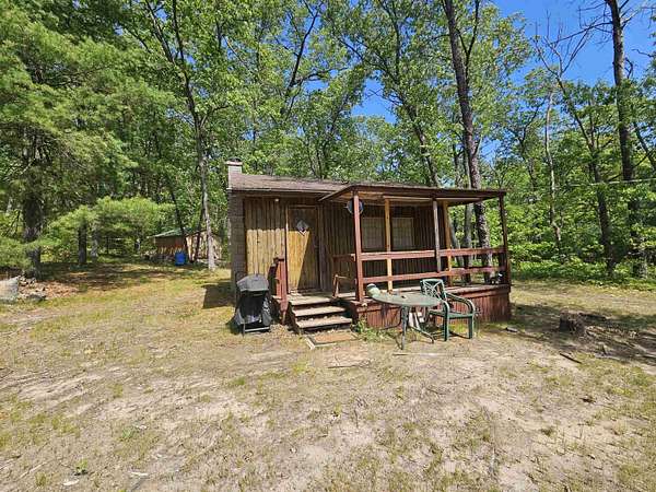 0.71 Acres of Land with Home for Sale in Harrison, Michigan