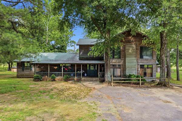 6 Acres of Land with Home for Sale in Romance, Arkansas