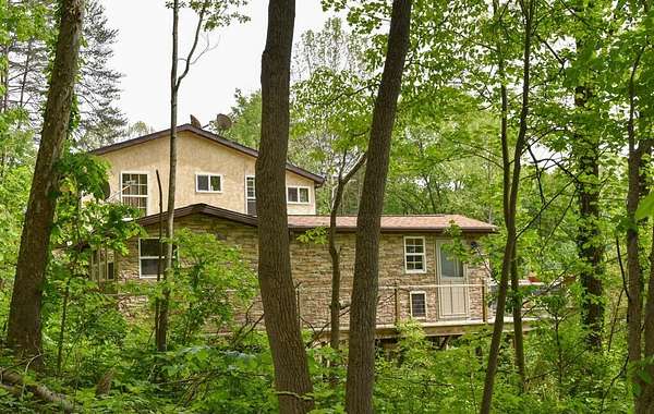 11.9 Acres of Land with Home for Sale in Logan, Ohio
