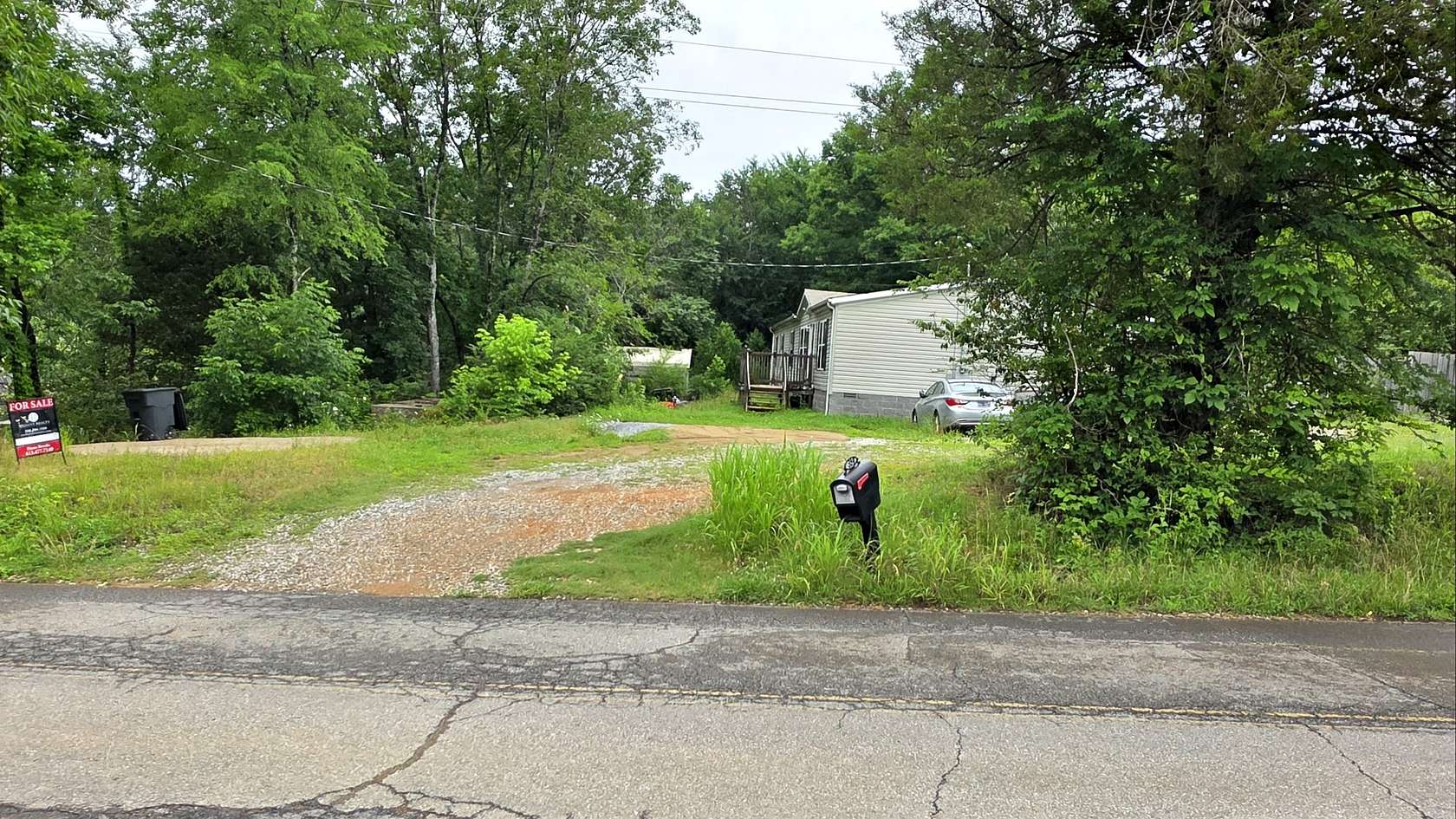 11.4 Acres of Land with Home for Sale in Charlotte, Tennessee