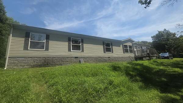 11.4 Acres of Land with Home for Sale in Charlotte, Tennessee