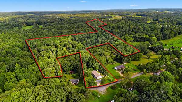 11.4 Acres of Land with Home for Sale in Charlotte, Tennessee