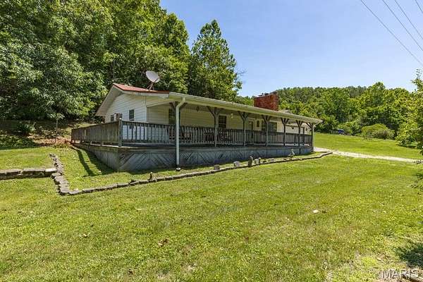 13.5 Acres of Recreational Land with Home for Sale in Lesterville, Missouri