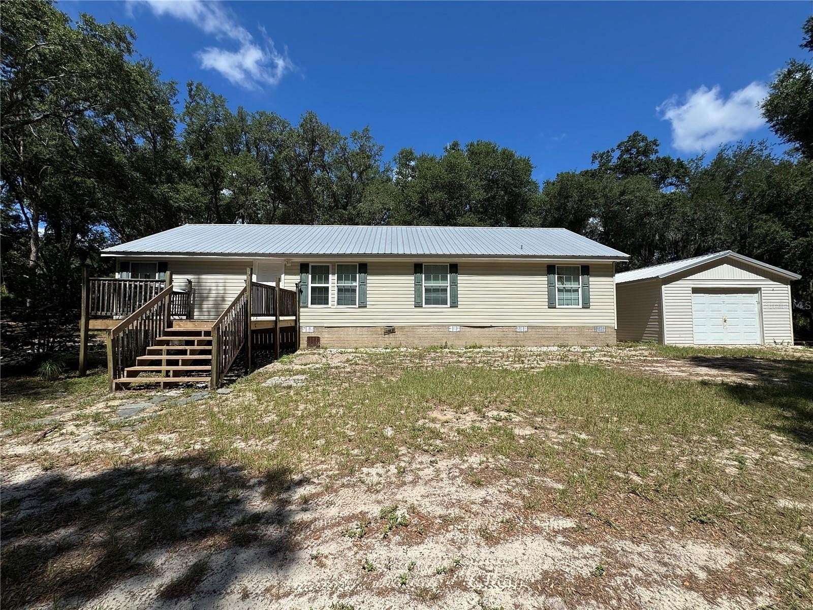 4.42 Acres of Land with Home for Sale in Summerfield, Florida