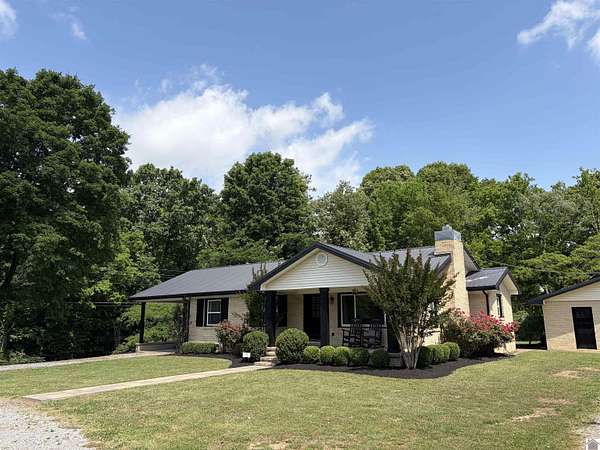 7.9 Acres of Land with Home for Sale in Paducah, Kentucky