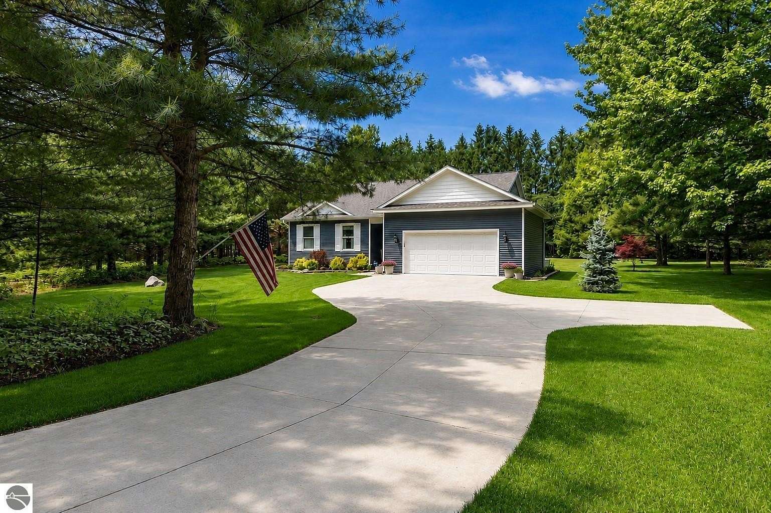 4 Acres of Land with Home for Sale in Lake Ann, Michigan