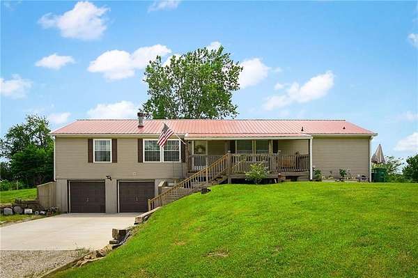5.2 Acres of Land with Home for Sale in Pleasant Hill, Missouri