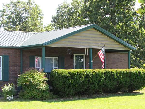 6.8 Acres of Land with Home for Sale in Kissee Mills, Missouri