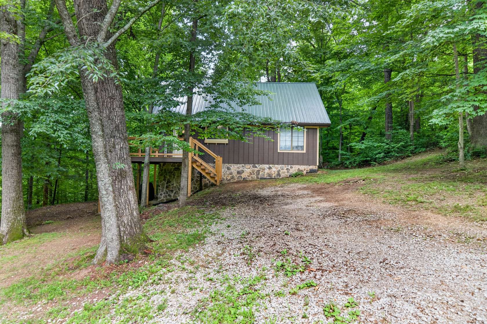 4.8 Acres of Land with Home for Sale in Red Boiling Springs, Tennessee