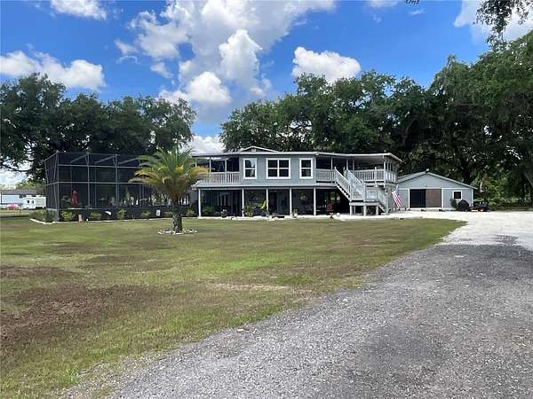 5.3 Acres of Land with Home for Sale in Kissimmee, Florida
