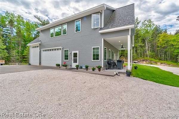 30 Acres of Recreational Land with Home for Sale in Doyle Township, Michigan