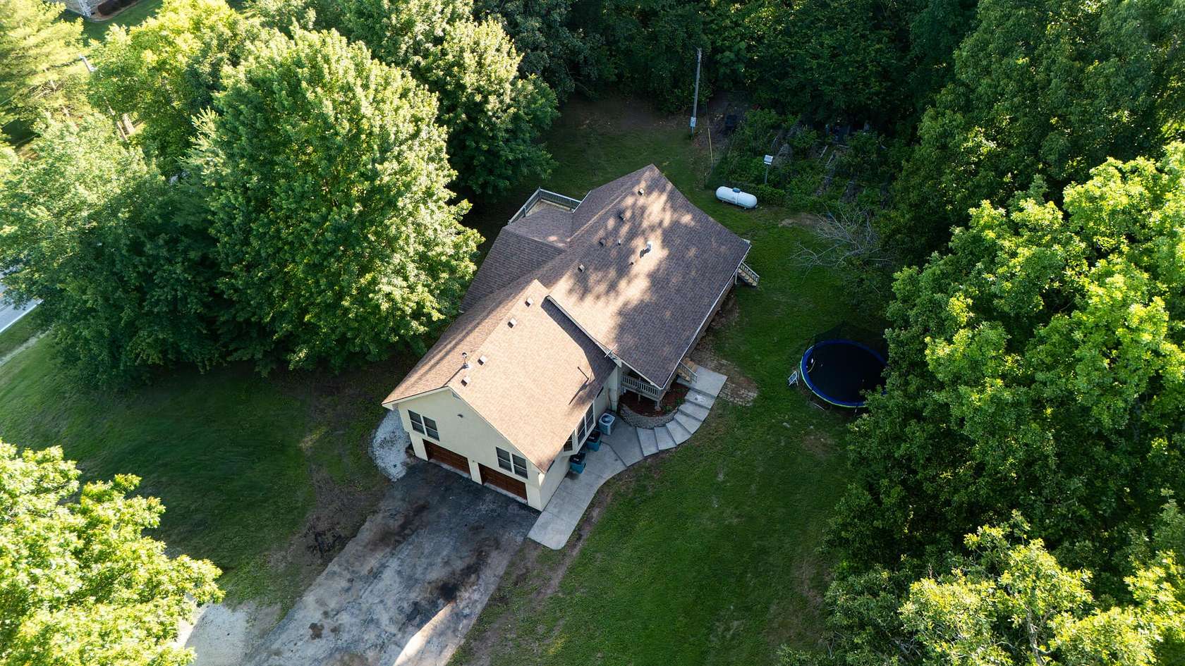 4.67 Acres of Land with Home for Sale in Brookline, Missouri