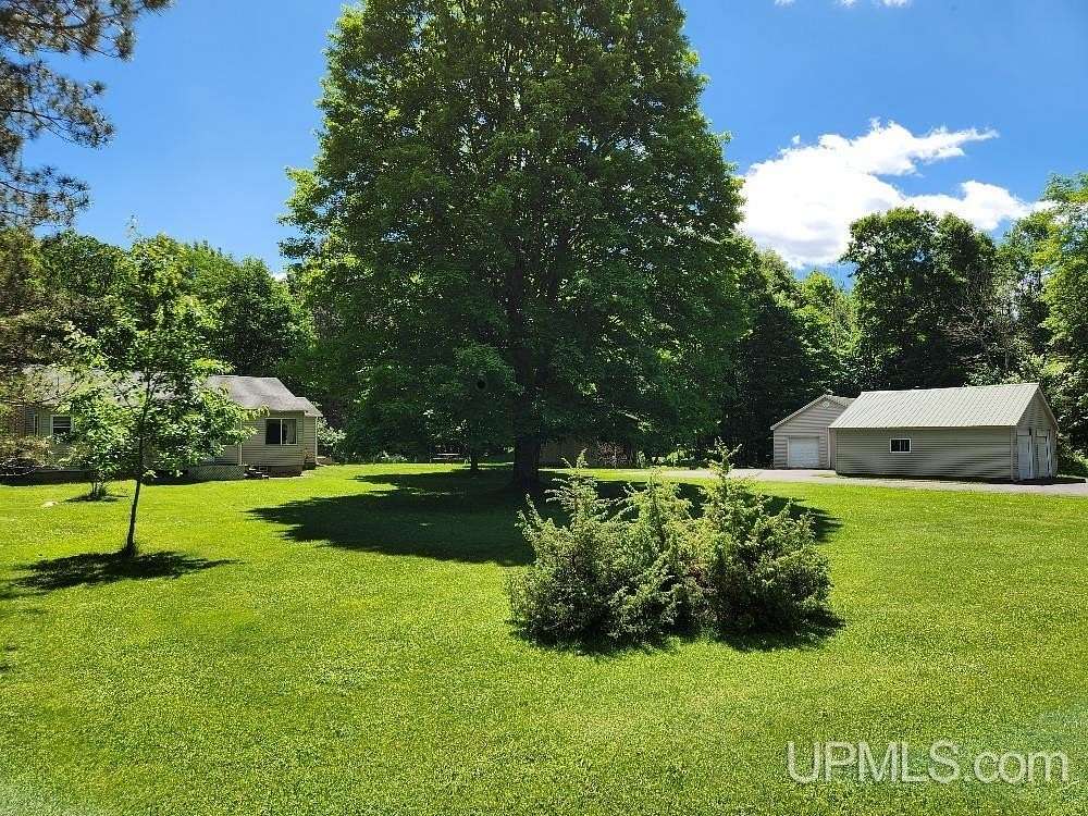 12.5 Acres of Land with Home for Sale in Iron River, Michigan
