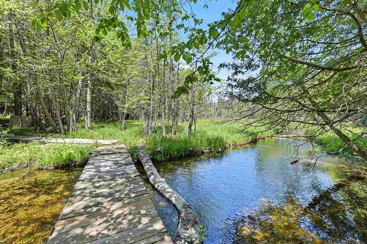 31 Acres of Recreational Land with Home for Sale in Central Lake, Michigan