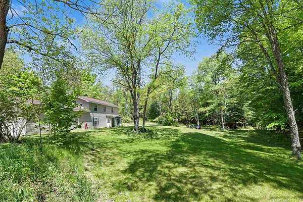 31 Acres of Recreational Land with Home for Sale in Central Lake, Michigan