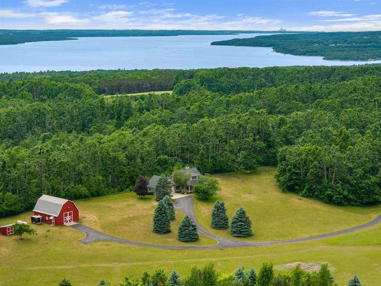 79 Acres of Recreational Land with Home for Sale in Boyne City, Michigan