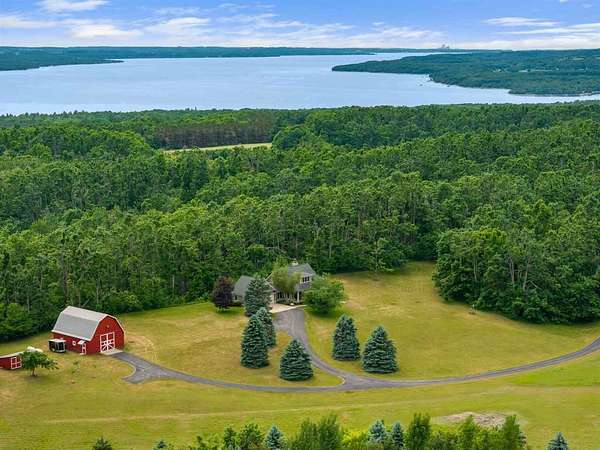 79 Acres of Recreational Land with Home for Sale in Boyne City, Michigan