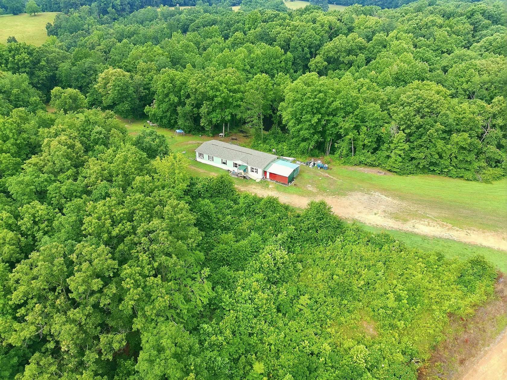 10.2 Acres of Land with Home for Sale in Lynnville, Tennessee