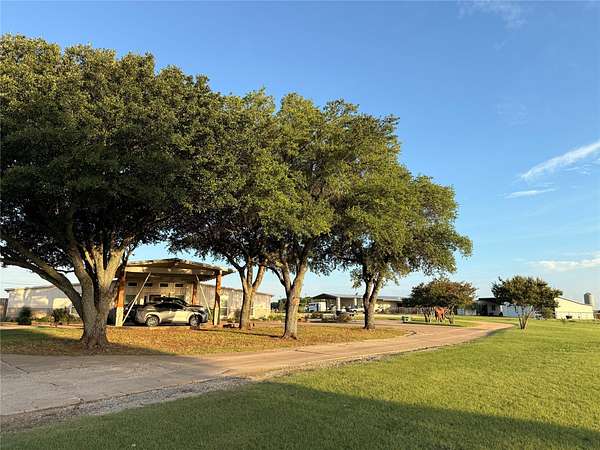 11.6 Acres of Land with Home for Sale in DISH, Texas