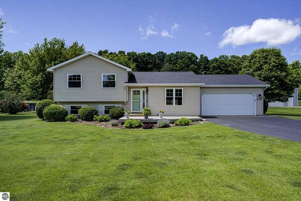 2 Acres of Land with Home for Sale in Kingsley, Michigan