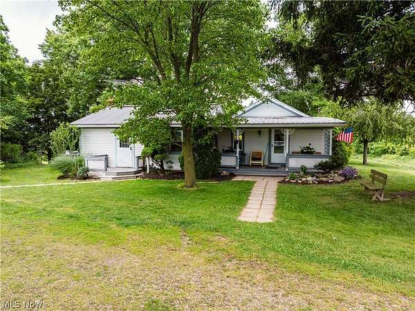 1.64 Acres of Land with Home for Auction in Millersburg, Ohio