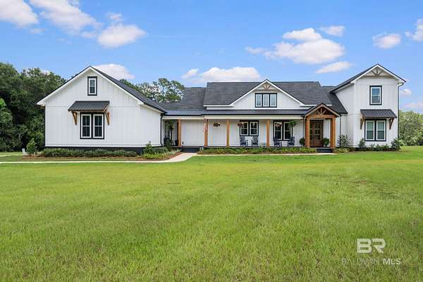 11.8 Acres of Recreational Land with Home for Sale in Elberta, Alabama
