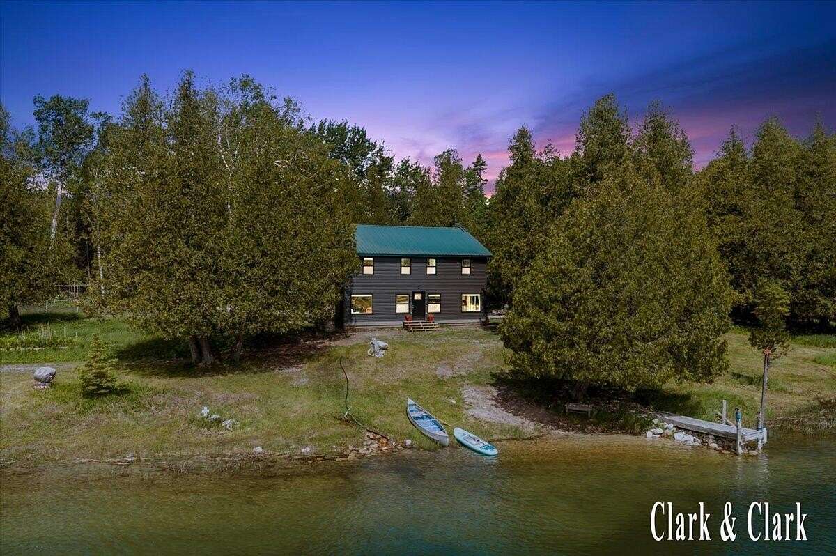 25.8 Acres of Recreational Land with Home for Sale in Drummond Island, Michigan