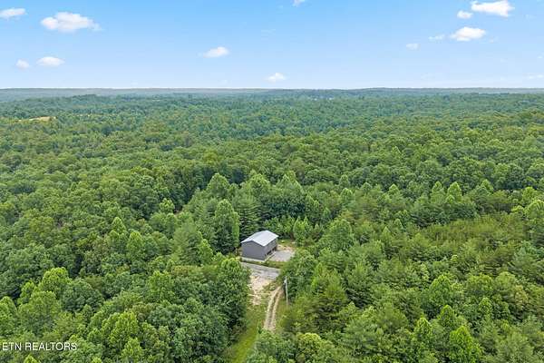 5 Acres of Land with Home for Sale in Deer Lodge, Tennessee