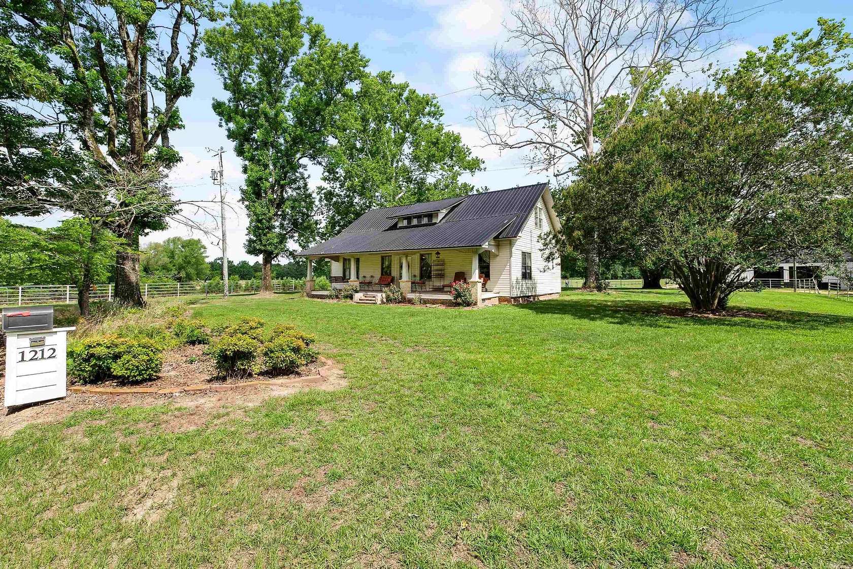 9 Acres of Land with Home for Sale in Benton, Arkansas