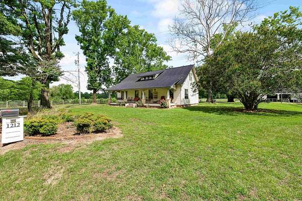 9 Acres of Land with Home for Sale in Benton, Arkansas