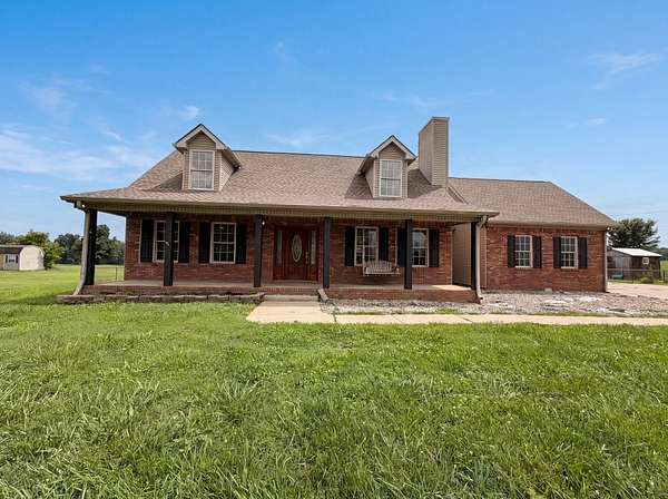 1.69 Acres of Land with Home for Sale in Cedar Hill, Tennessee