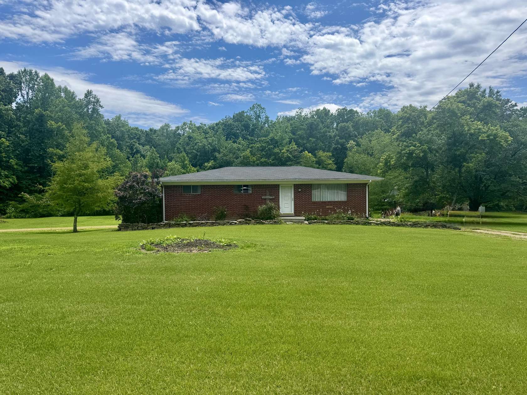 5.49 Acres of Land with Home for Sale in Linden, Tennessee