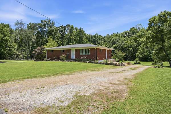 5.49 Acres of Land with Home for Sale in Linden, Tennessee