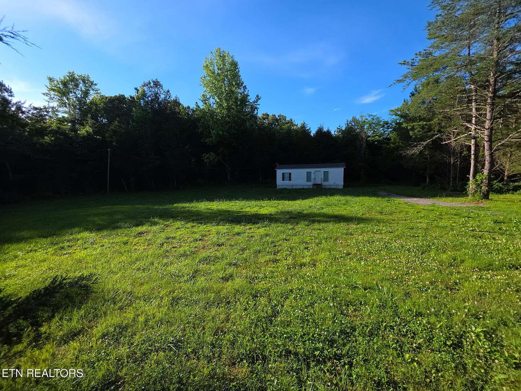 7.36 Acres of Land with Home for Sale in Calhoun, Tennessee