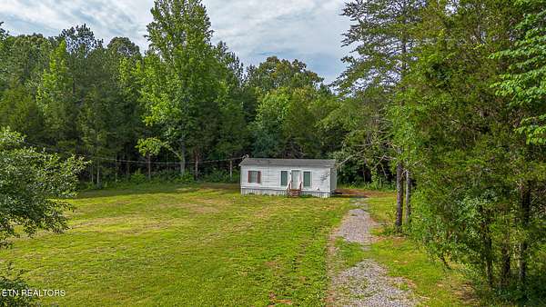 7.36 Acres of Land with Home for Sale in Calhoun, Tennessee