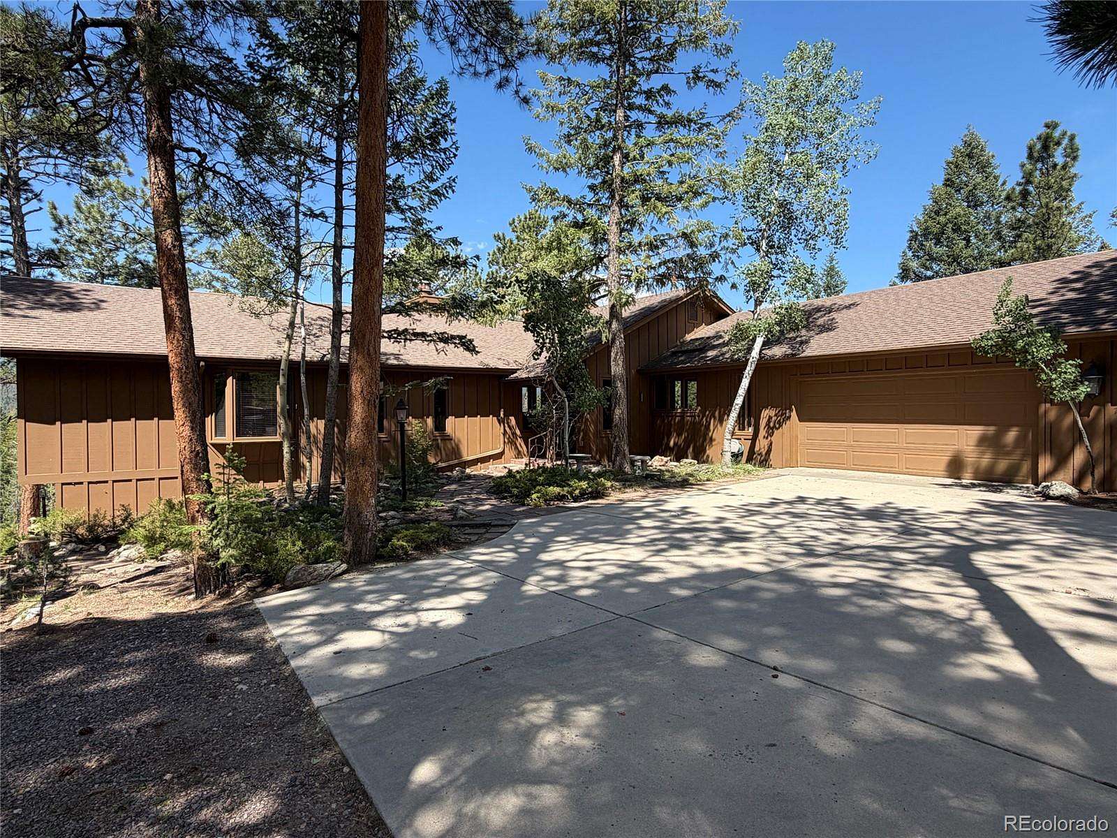 2.5 Acres of Land with Home for Sale in Evergreen, Colorado
