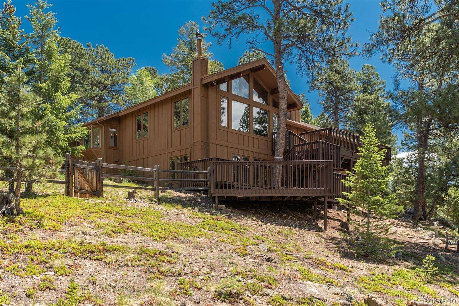 2.5 Acres of Land with Home for Sale in Evergreen, Colorado