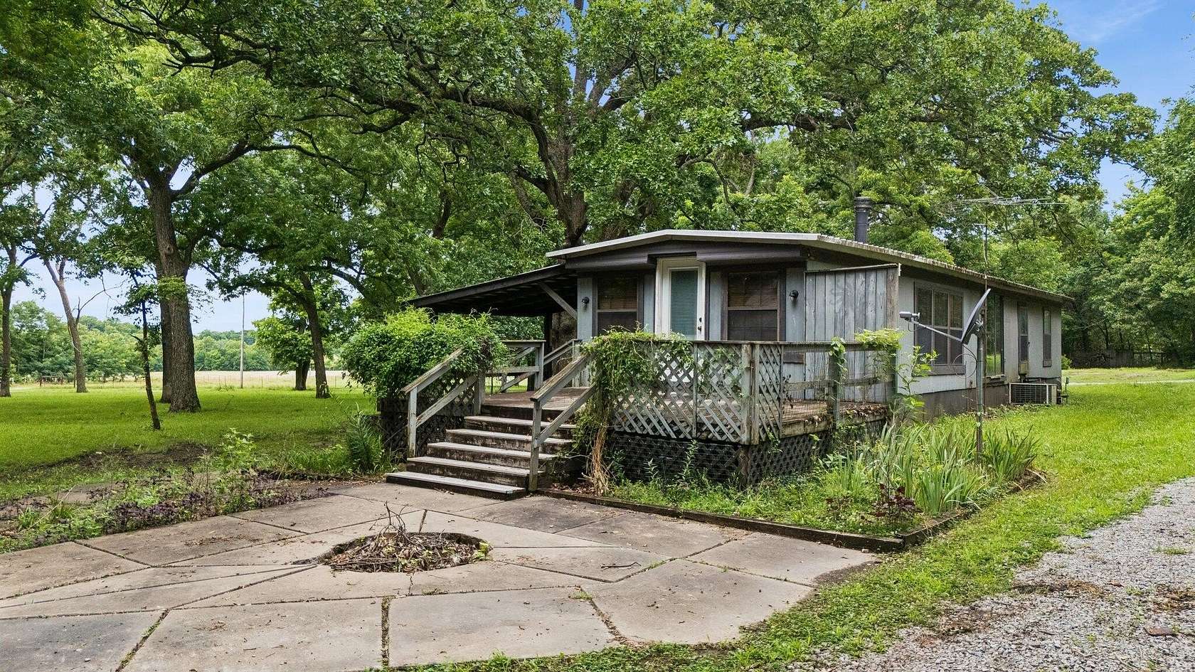 20 Acres of Recreational Land with Home for Sale in Claremore, Oklahoma