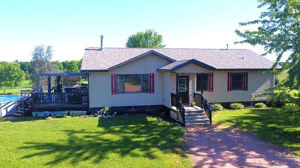 16 Acres of Land with Home for Sale in Merrill, Wisconsin