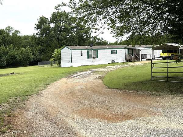2.5 Acres of Land with Home for Sale in Bells, Texas
